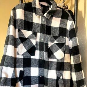 Women’s or junior Full length flannel ￼thick coat. Black and white